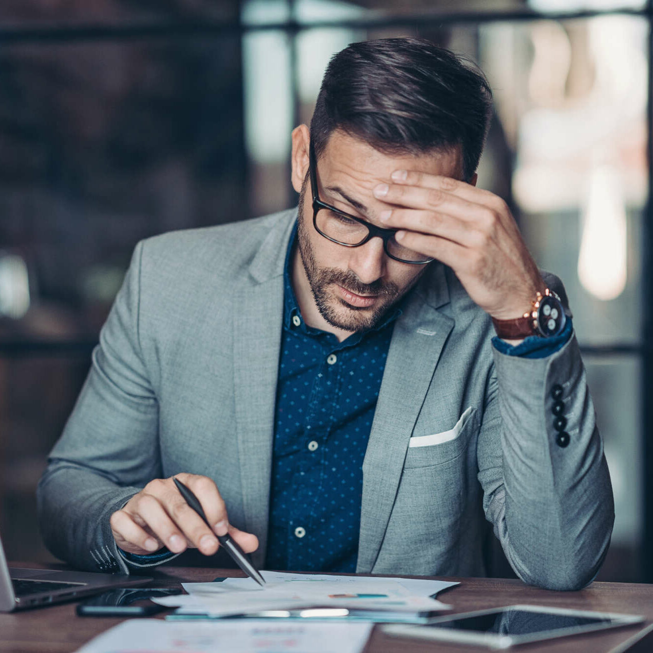 Worried businessman working in the office